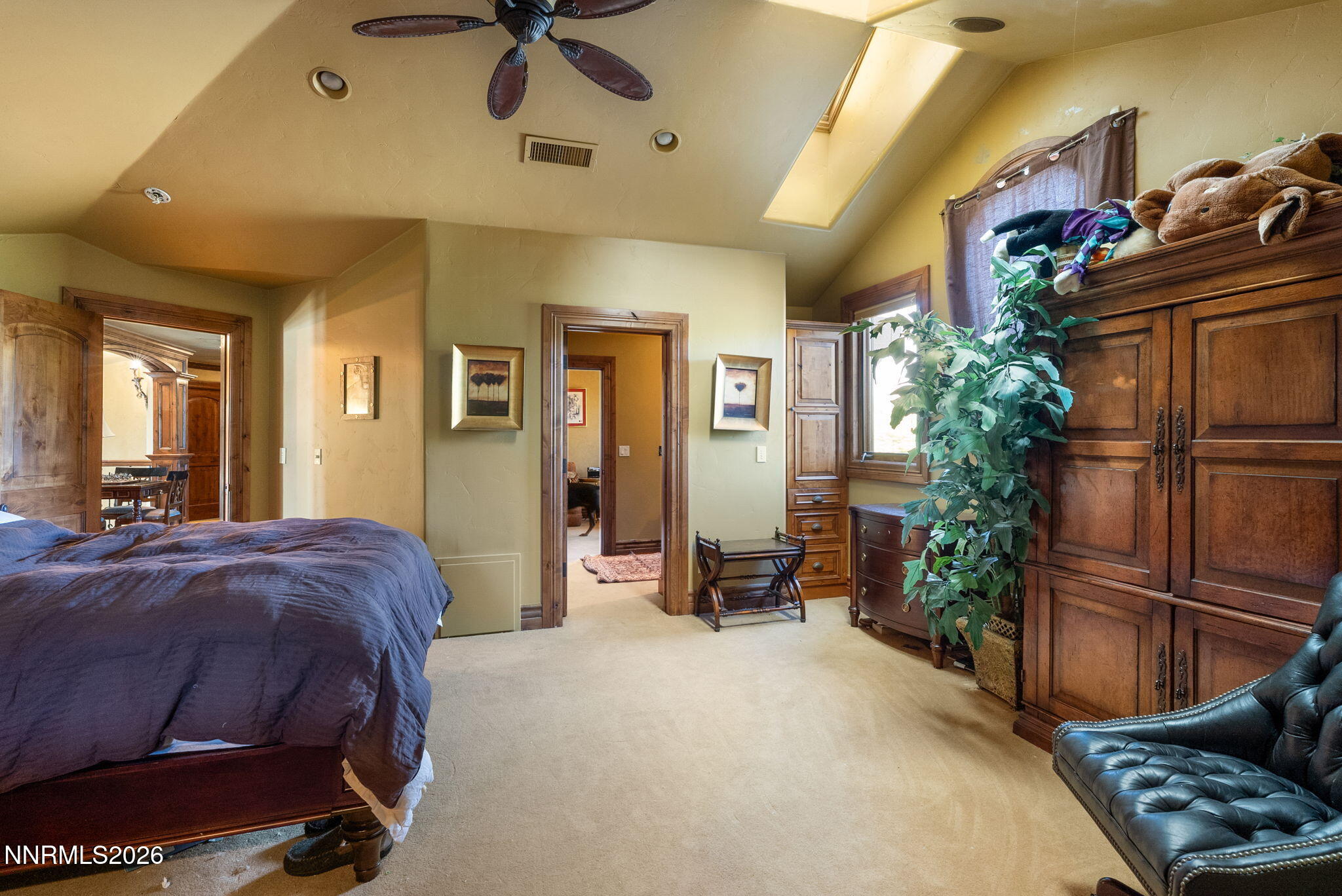 123 Andrew Lane Reno, NV 89521 - Photo 33 of 50 a bedroom with a bed and wooden floor