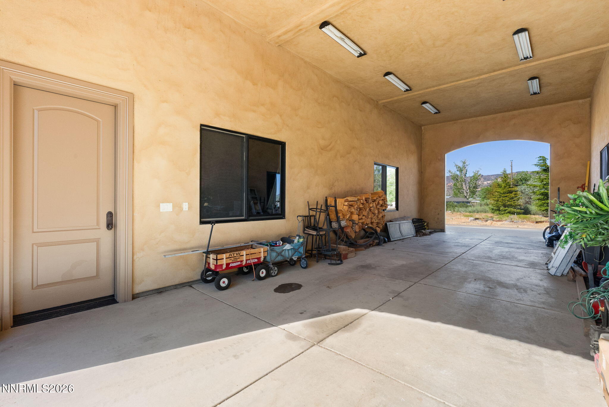 123 Andrew Lane Reno, NV 89521 - Photo 35 of 50 a bedroom with furniture and a window