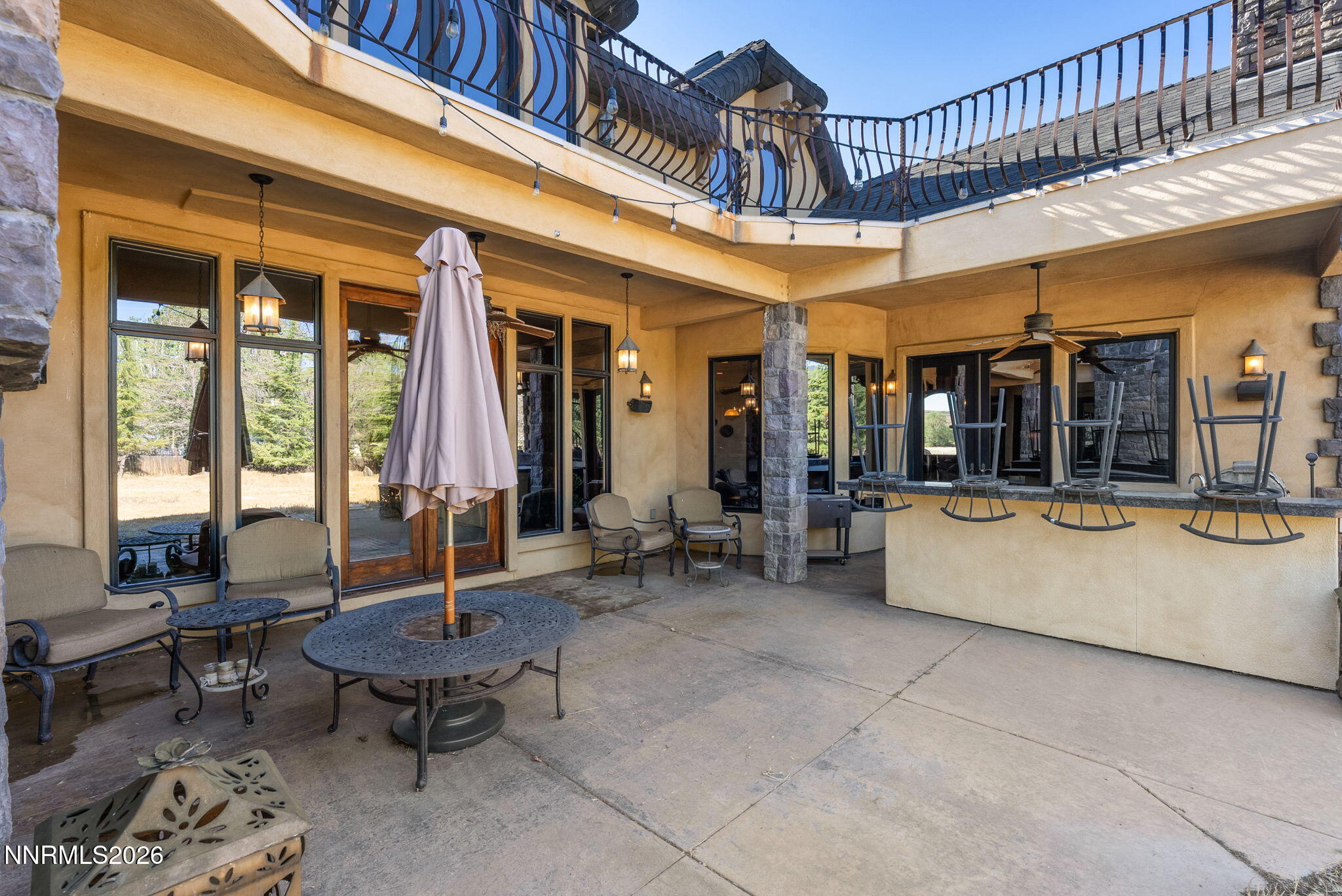 123 Andrew Lane Reno, NV 89521 - Photo 42 of 50 a view of a chairs and table in the patio