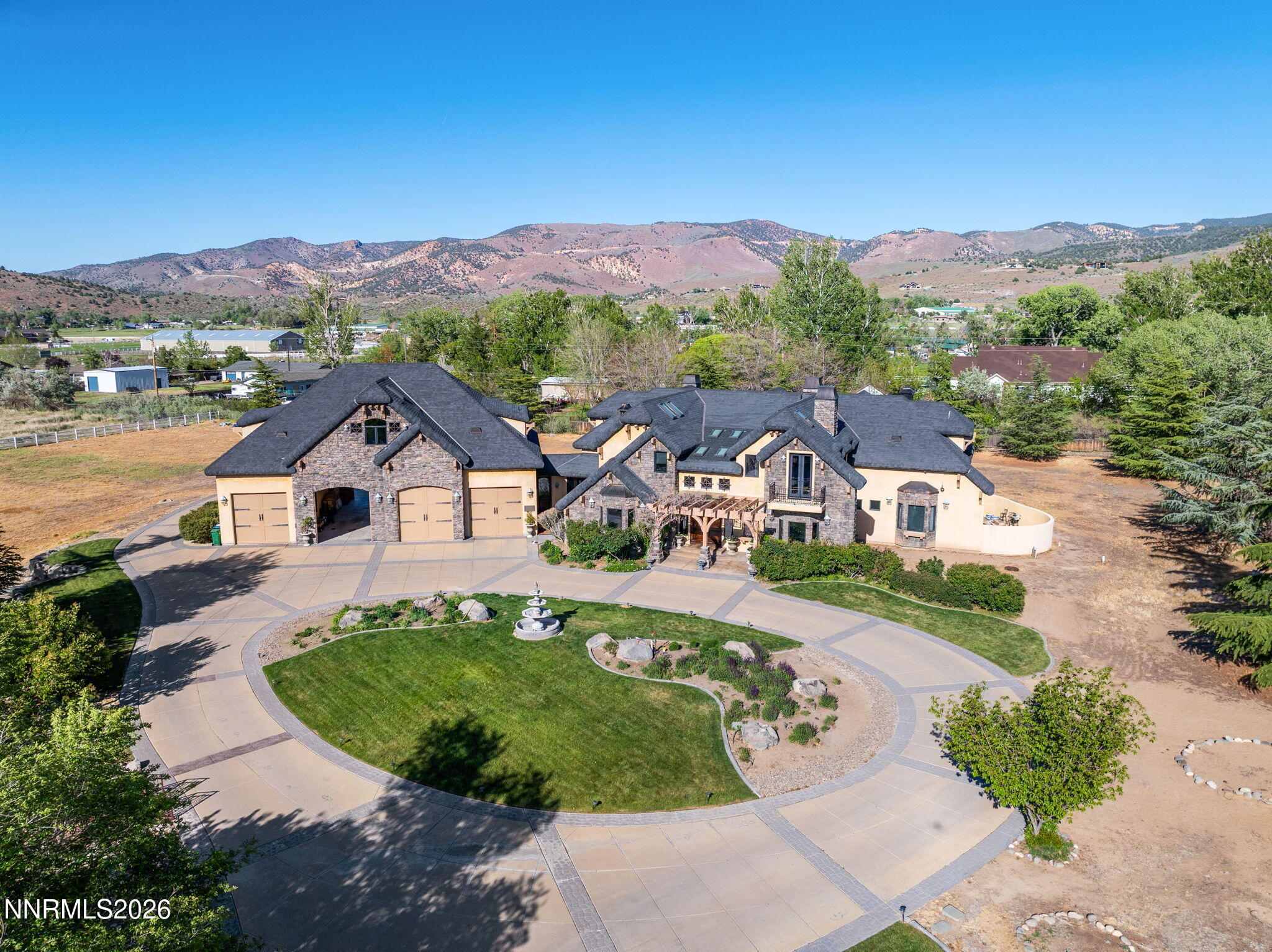 123 Andrew Lane Reno, NV 89521 - Photo 47 of 50 an aerial view of a house with a garden