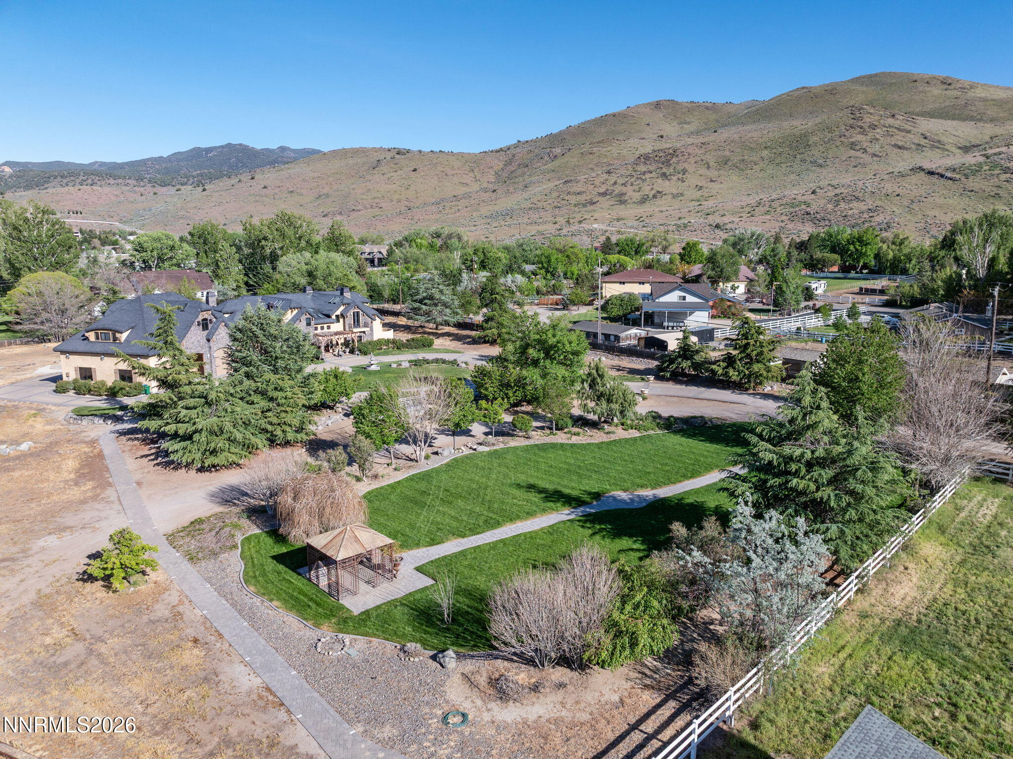 123 Andrew Lane Reno, NV 89521 - Photo 50 of 50 an aerial view of a house with mountain view