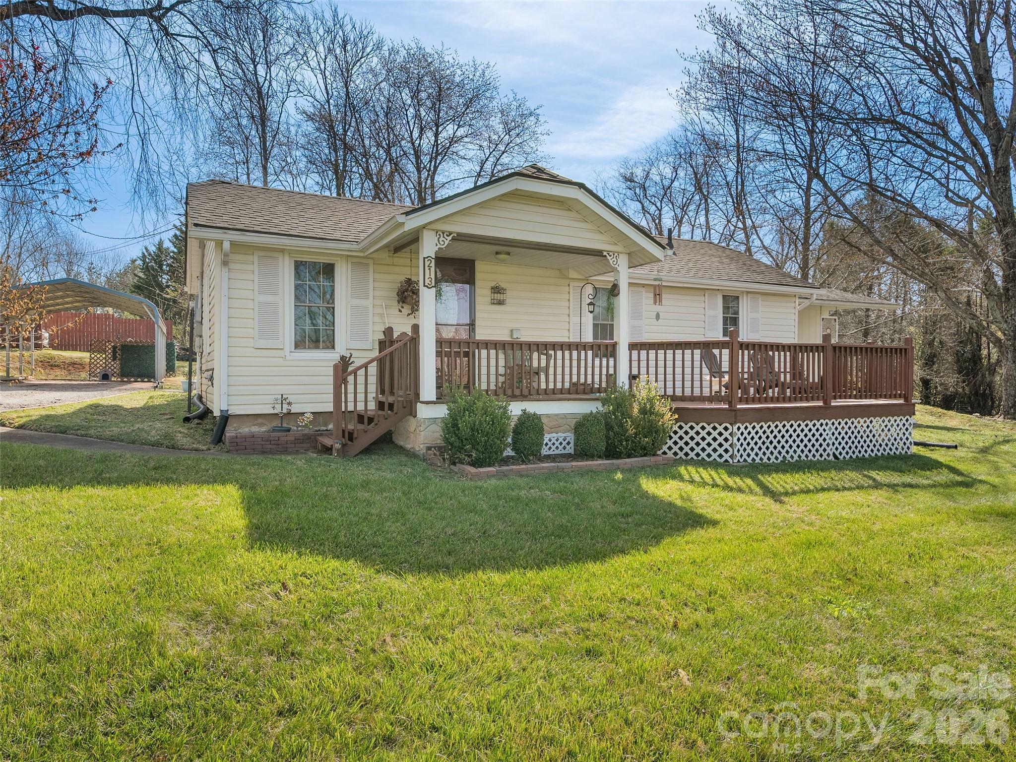19 Mingus Street Canton, NC 28716 - Photo 1 of 28 a view of a house with a swimming pool