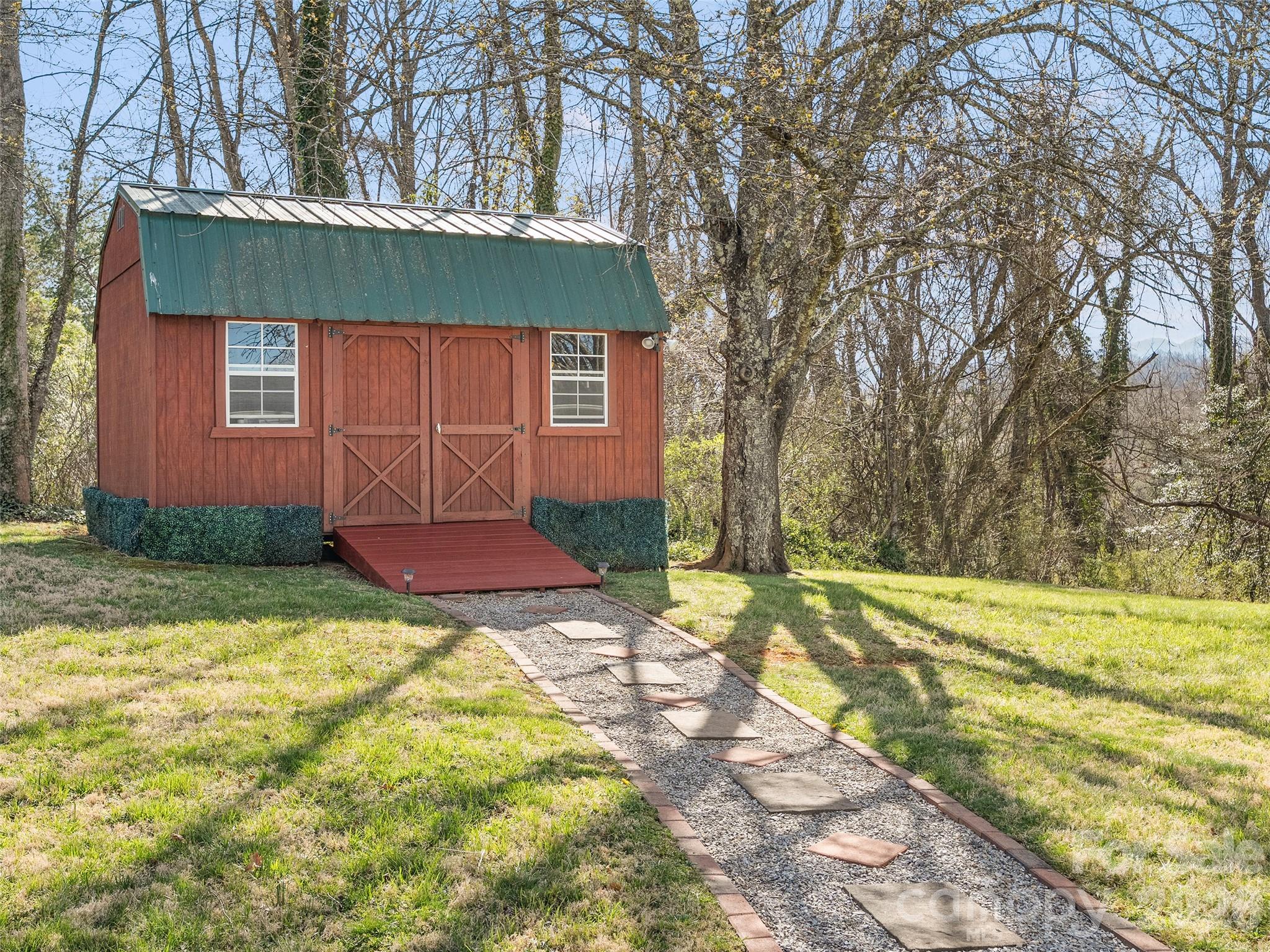 19 Mingus Street Canton, NC 28716 - Photo 26 of 28 a view of a house with a yard