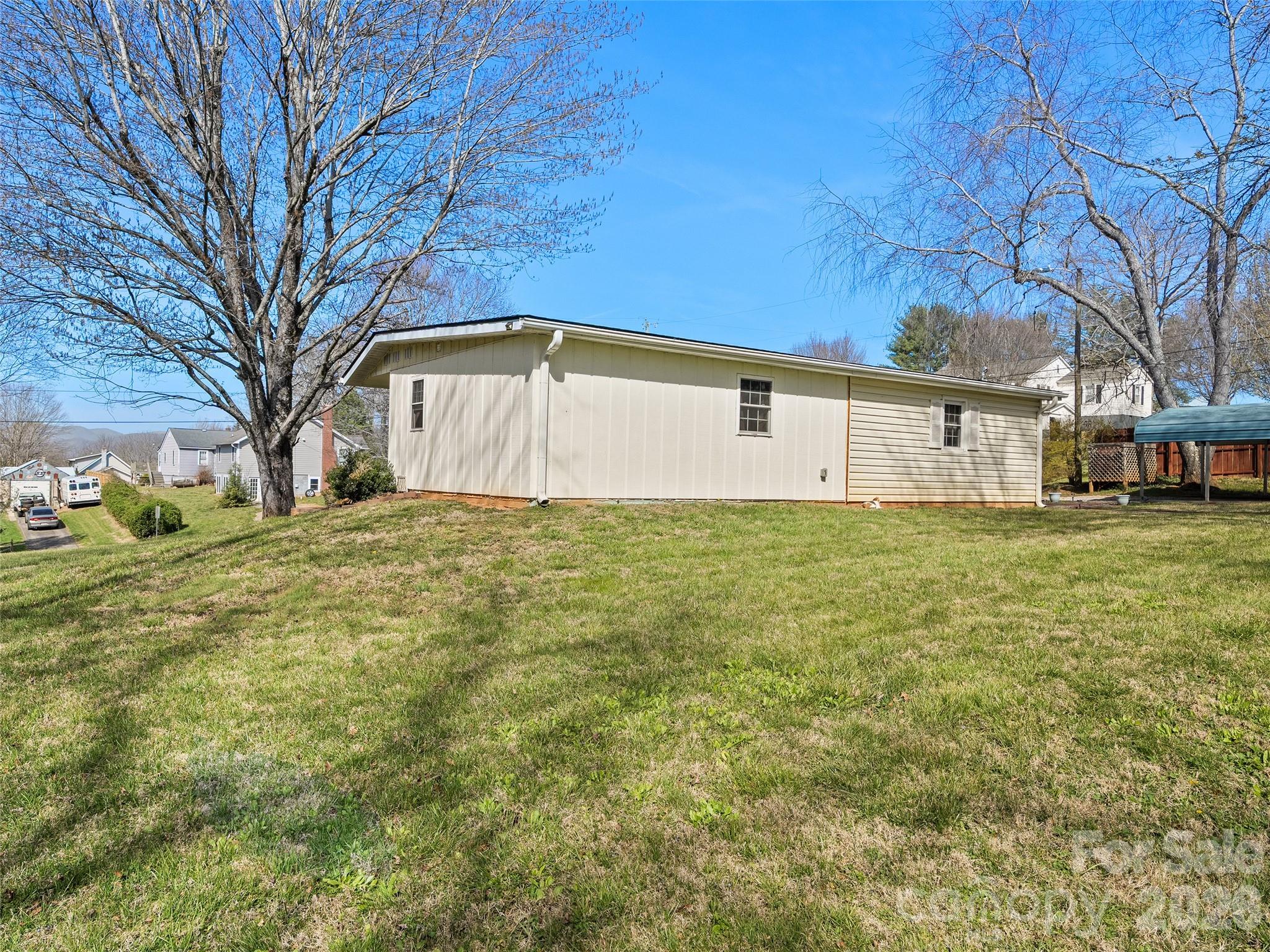 19 Mingus Street Canton, NC 28716 - Photo 27 of 28 a view of a yard with a house