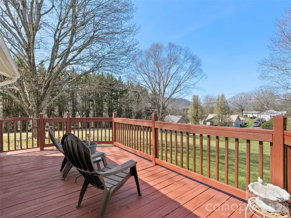 a view of a two chairs in the deck