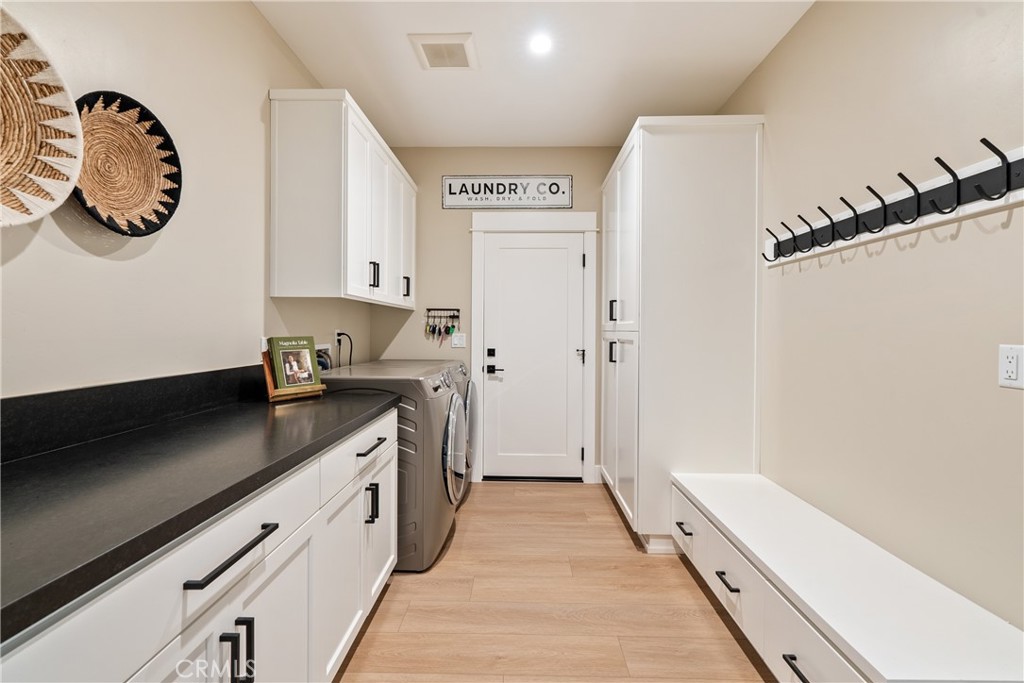 8550 El Corte Road Atascadero, CA 93422 - Photo 33 of 72 a kitchen with a refrigerator and a stove