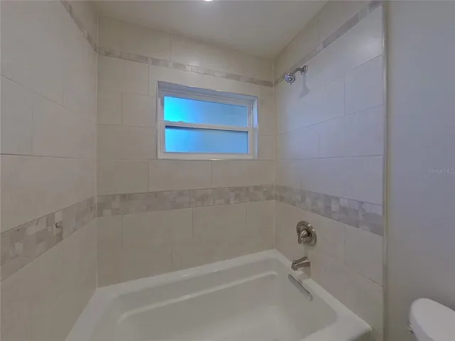 a bathroom with a bathtub