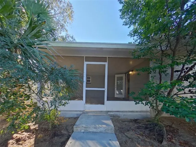 view of a house with a yard