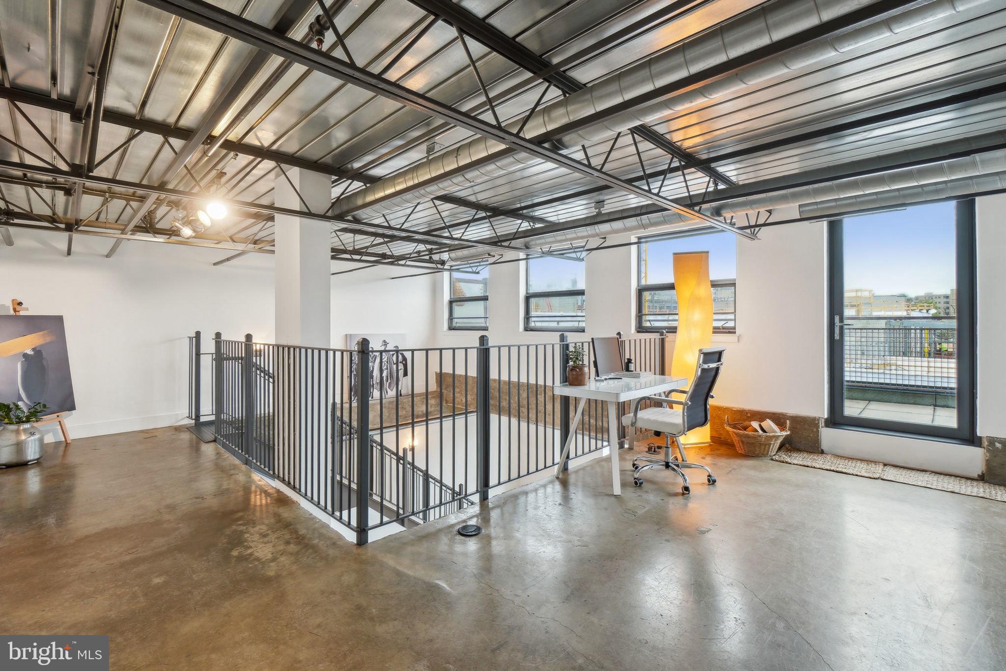 2301 Champlain Street Northwest, Unit 412 Washington, DC 20009 - Photo 11 of 20 a view of a room with wooden floor