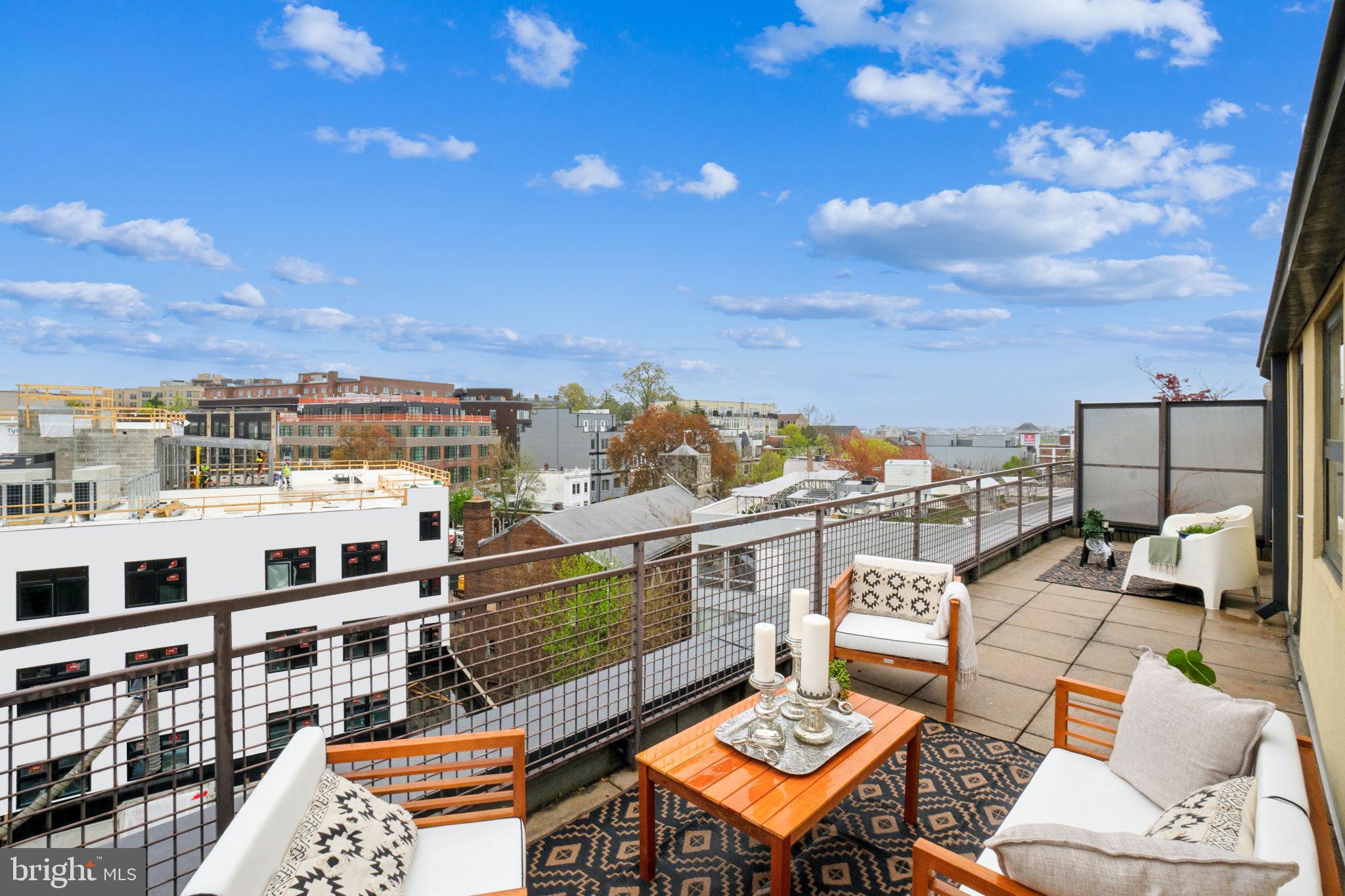2301 Champlain Street Northwest, Unit 412 Washington, DC 20009 - Photo 17 of 20 a view of a balcony with city view
