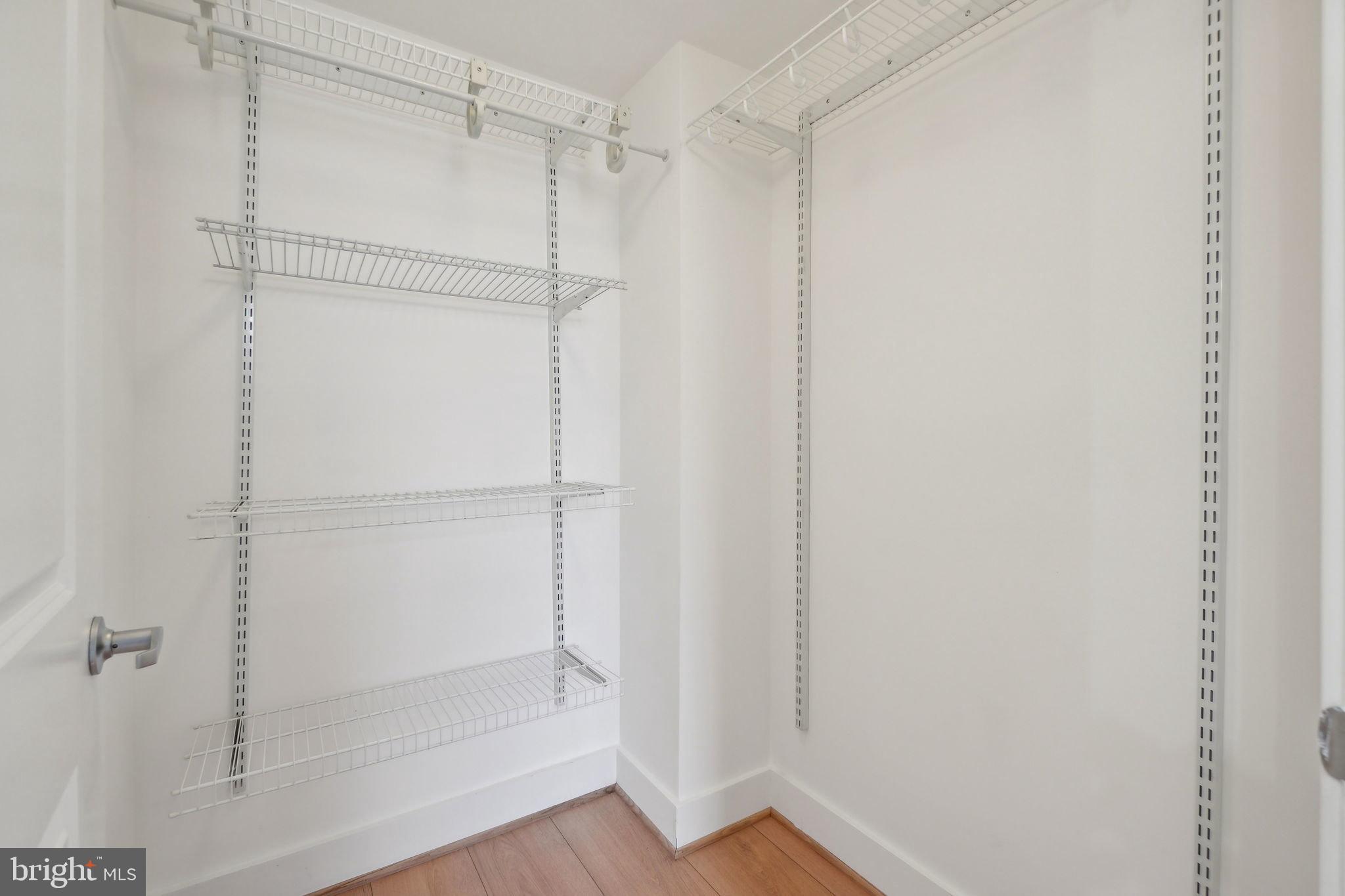 2301 Champlain Street Northwest, Unit 412 Washington, DC 20009 - Photo 8 of 20 a bathroom with a glass shower door