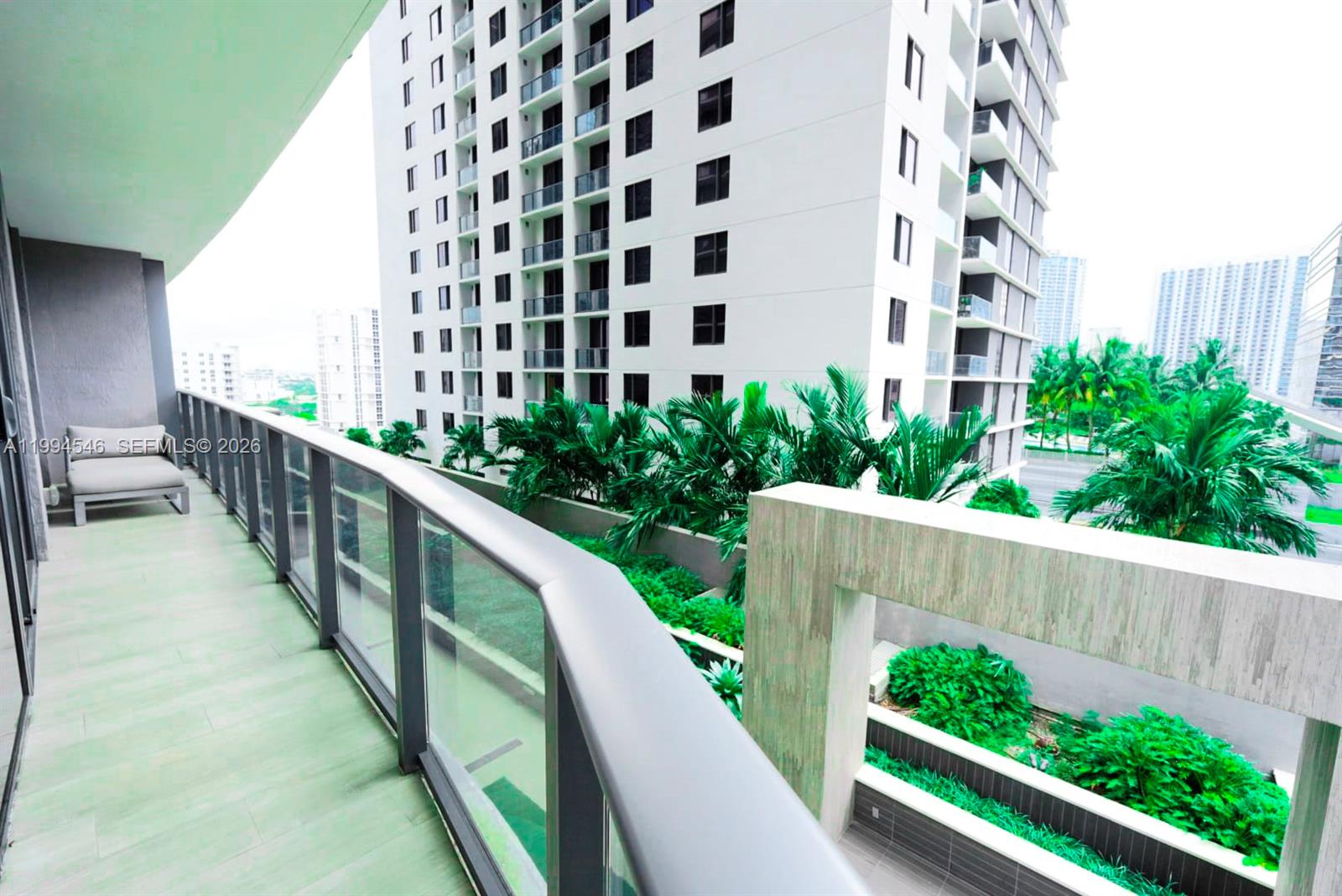 55 Southwest 9th Street, Unit 1001 Miami, FL 33130 - Photo 27 of 30 a view of a building from a balcony