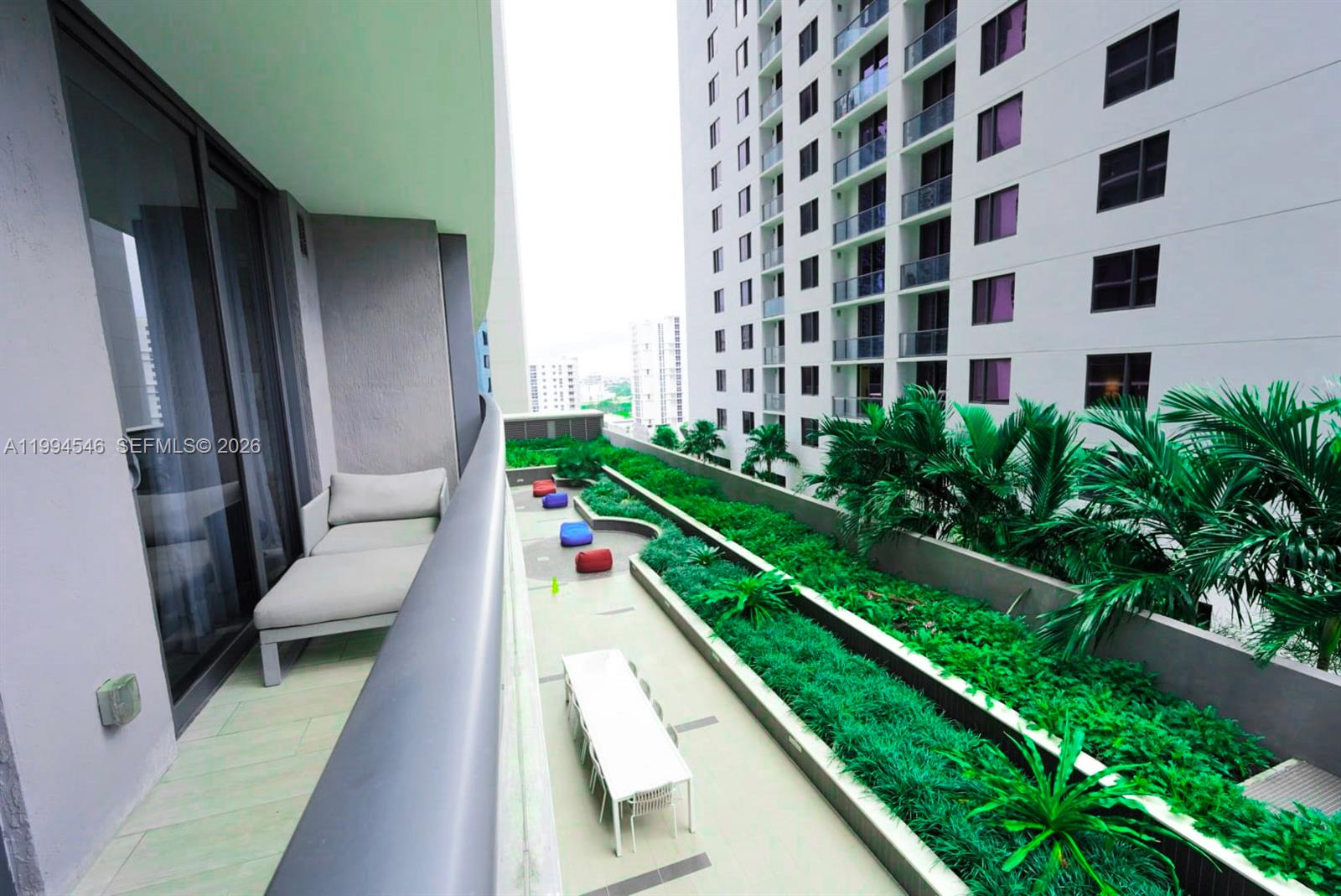 55 Southwest 9th Street, Unit 1001 Miami, FL 33130 - Photo 28 of 30 a view of an outdoor space with seating area