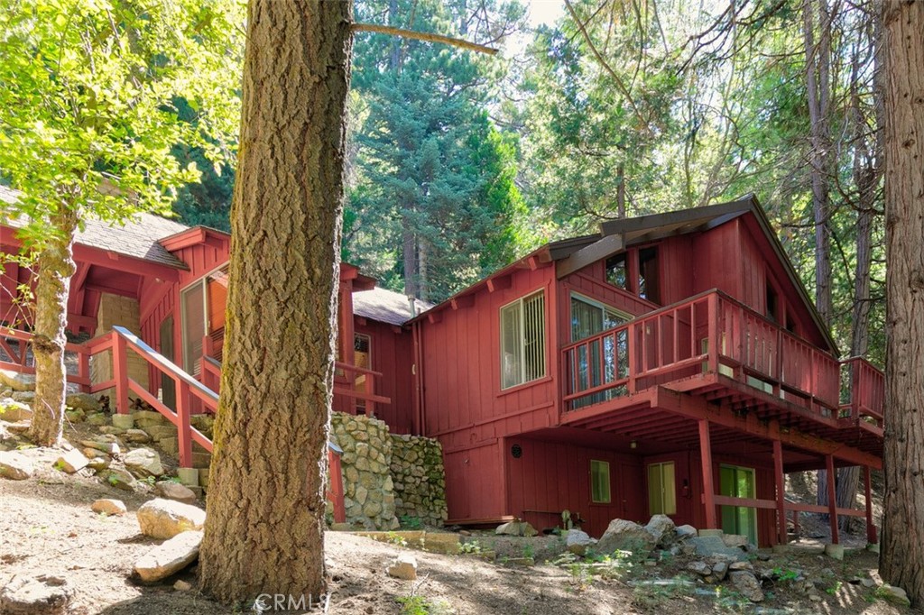 465 Blue Jay Canyon Road Blue Jay, CA 92317 - Photo 6 of 26 a view of a house with a yard