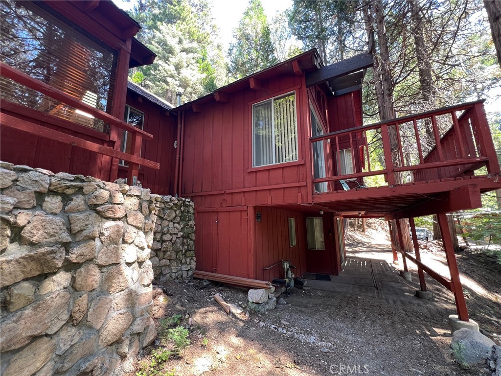 465 Blue Jay Canyon Road Blue Jay, CA 92317 - Photo 8 of 26 a front view of a house with a yard