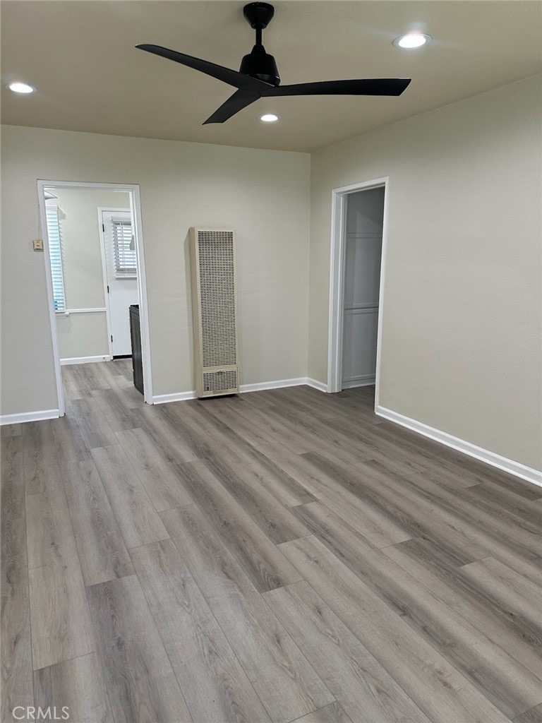 15702 Halldale Avenue Gardena, CA 90247 - Photo 11 of 25 a view of empty room with wooden floor