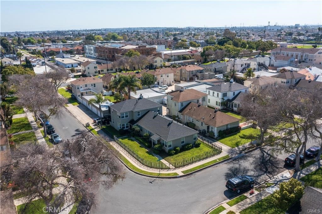 15702 Halldale Avenue Gardena, CA 90247 - Photo 2 of 25 an aerial view of a house with a garden and lake view