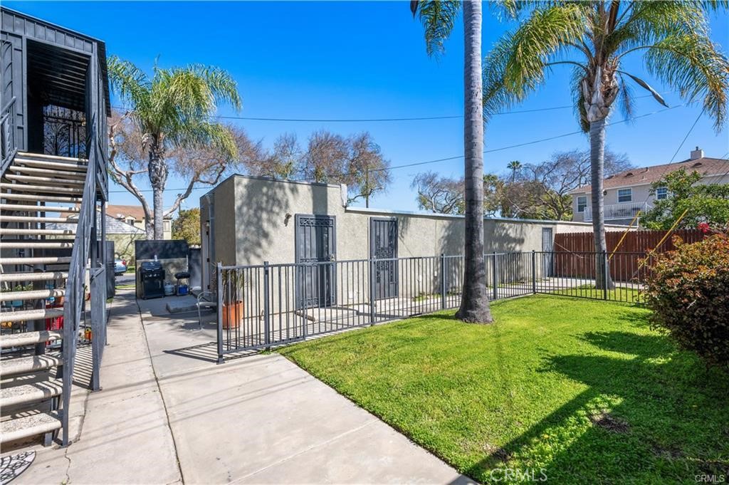 15702 Halldale Avenue Gardena, CA 90247 - Photo 21 of 25 a view of a garden with a building