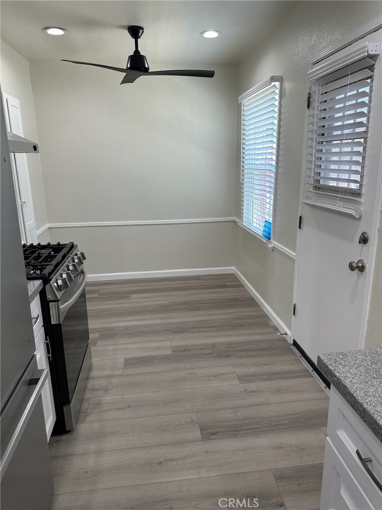 15702 Halldale Avenue Gardena, CA 90247 - Photo 5 of 25 a view of an empty room with a window