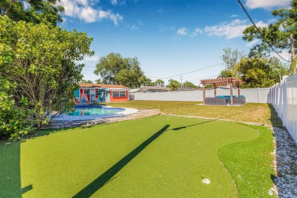 a view of an outdoor space with swimming pool