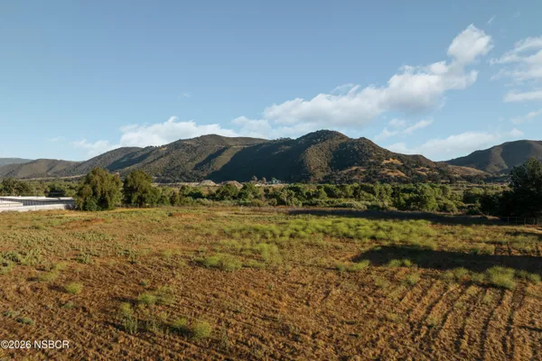 a view of an outdoor space and mountains