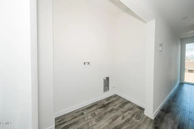 a view of small space with wooden floor