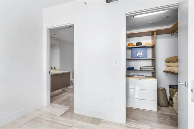 a bathroom with a shower and a tub