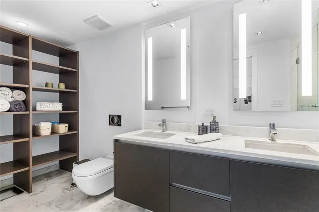 a view of a city with tall buildings