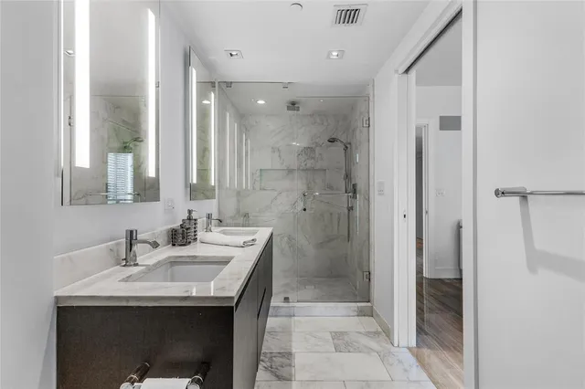 a view of a living room and a wooden floor