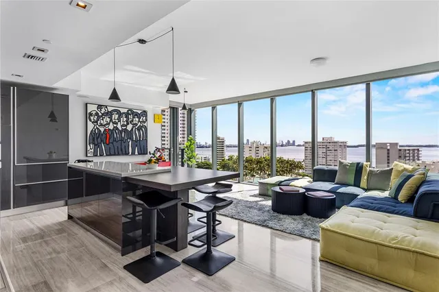 a kitchen with a table and chairs in it