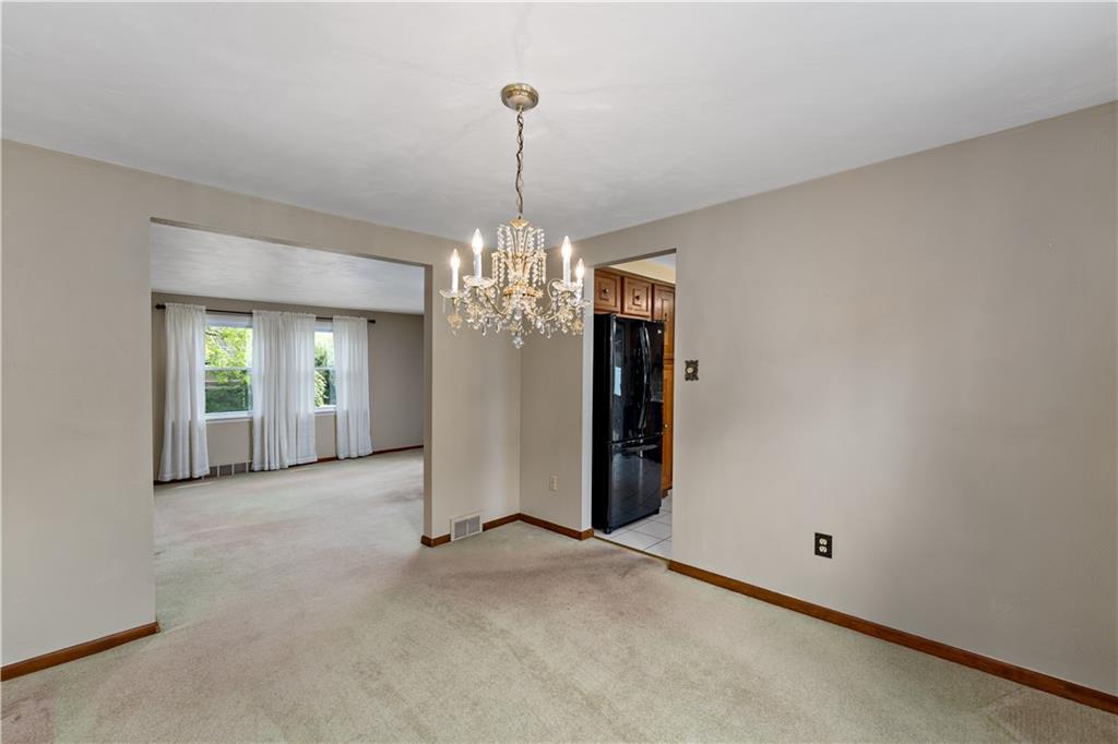 27 Dover Road Irwin, PA 15642 - Photo 8 of 43 a view of a chandelier in big room and chandelier