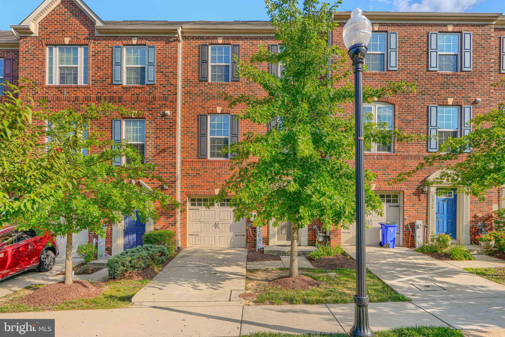 7336 Summit Rock Road Elkridge, MD 21075 - Photo 1 of 46 Charming brick townhome with greenery.