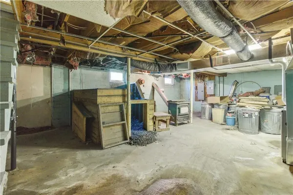 a view of a room with wooden shelves