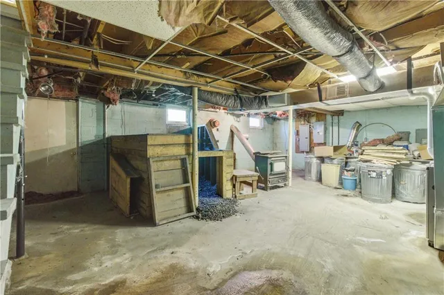 a view of a room with wooden shelves