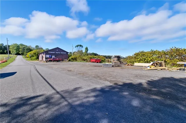 a view of a road with cars