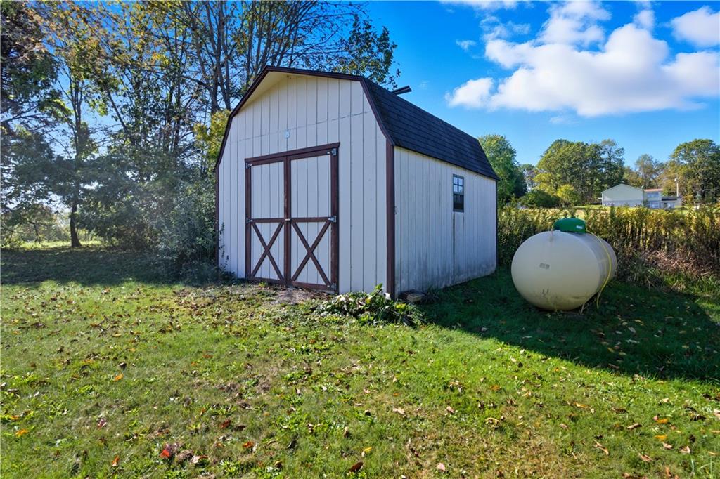 92 North Summit Road Reynoldsville, PA 15851 - Photo 20 of 20 a backyard of a house with lots of green space