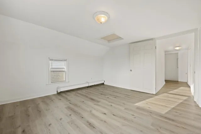 a view of an empty room and window