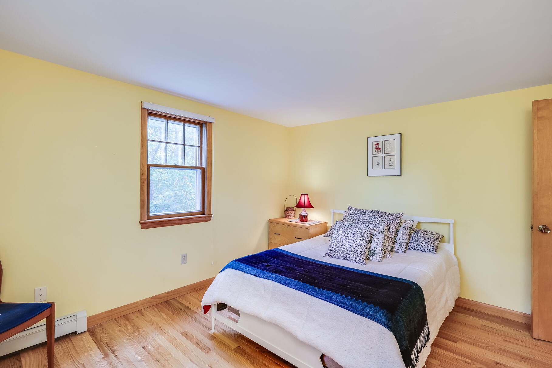 50 Slow Turtle Way Wellfleet, MA 02667 - Photo 17 of 37 a bedroom with a bed and wooden floor