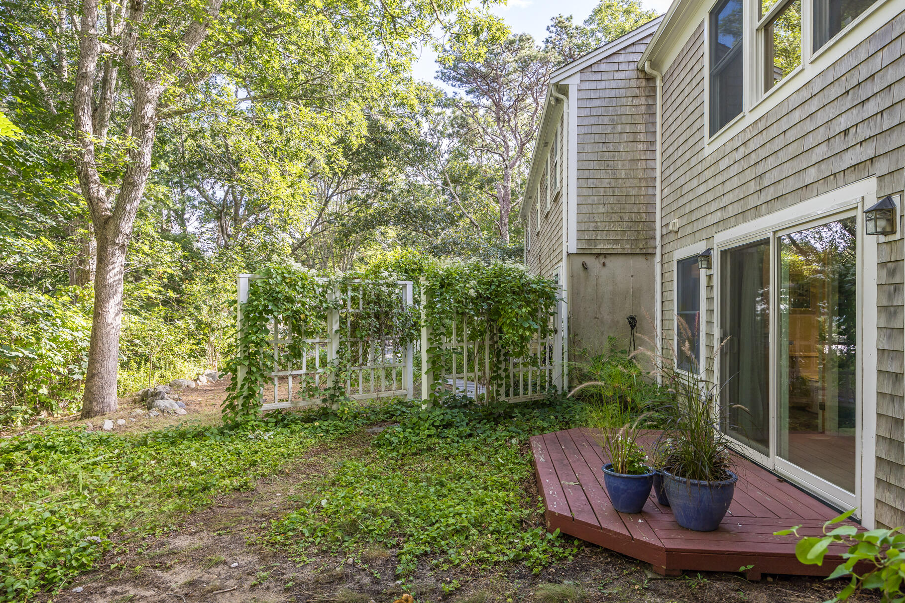50 Slow Turtle Way Wellfleet, MA 02667 - Photo 21 of 37 a view of a house with backyard and sitting area