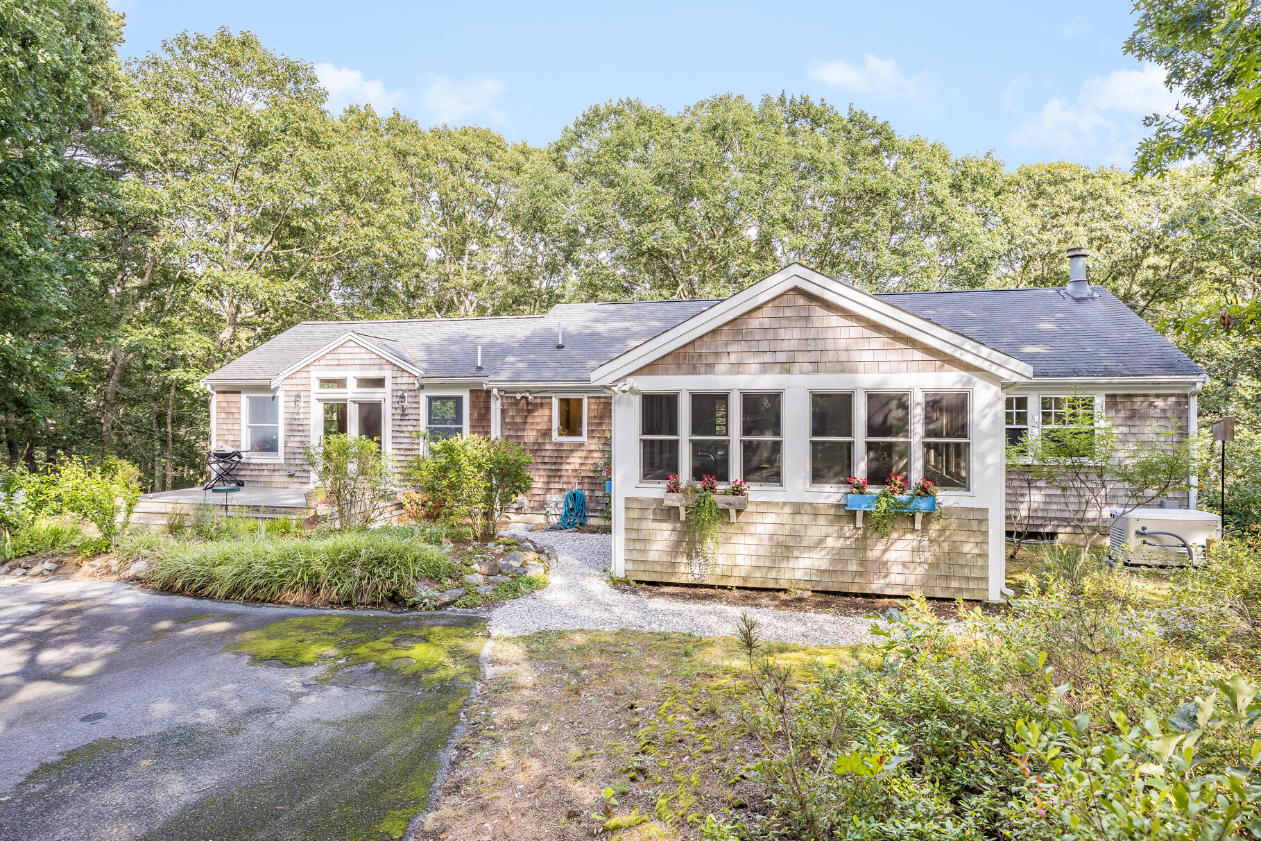 50 Slow Turtle Way Wellfleet, MA 02667 - Photo 28 of 37 a front view of house with yard outdoor seating and green space