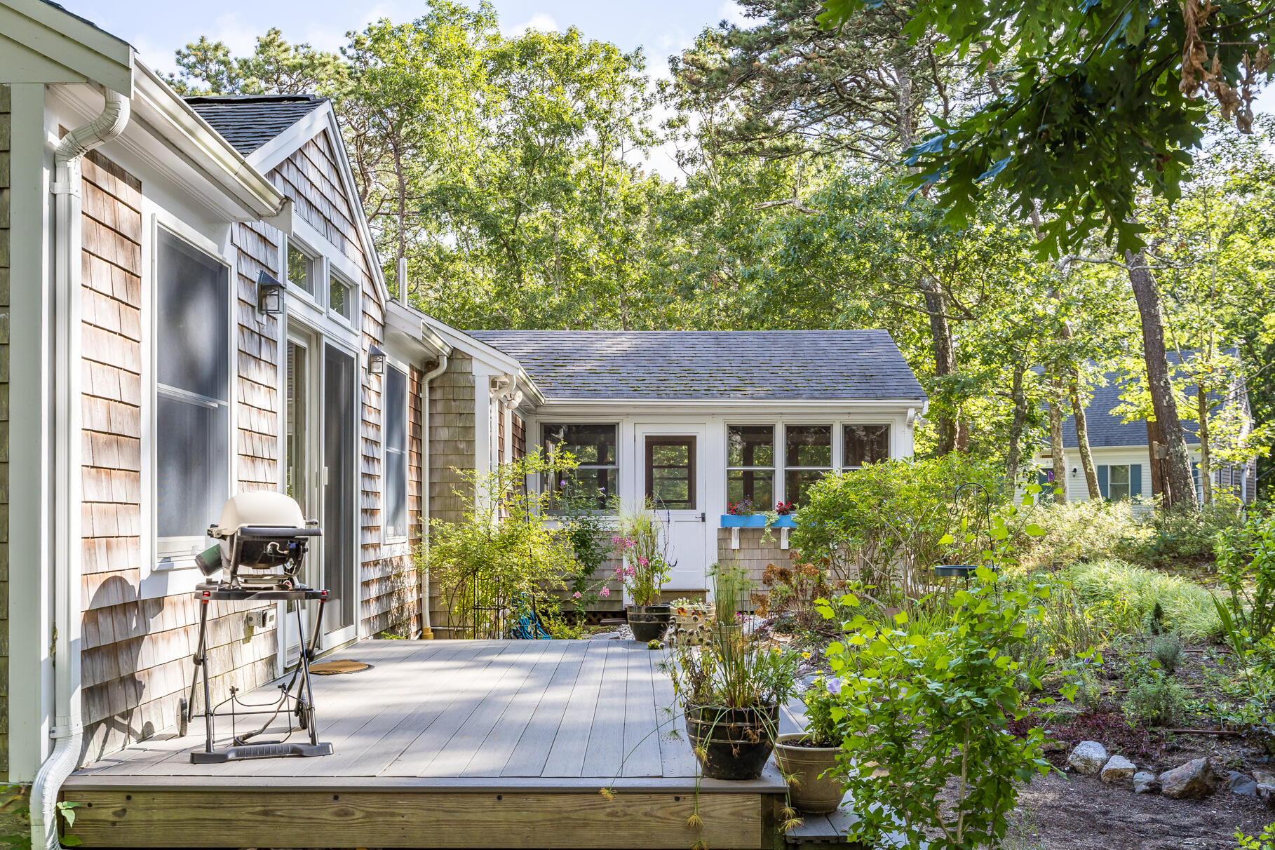 50 Slow Turtle Way Wellfleet, MA 02667 - Photo 29 of 37 a front view of house with yard outdoor seating and green space