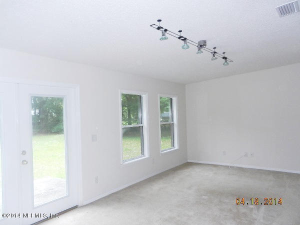 9173 Hipps Road Jacksonville, FL 32222 - Photo 8 of 23 family room view 2
