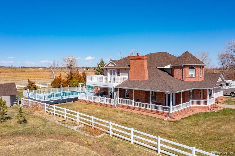 8283 Hygiene Road Longmont, CO 80503 - Photo 3 of 27 a view of a house with a ocean view