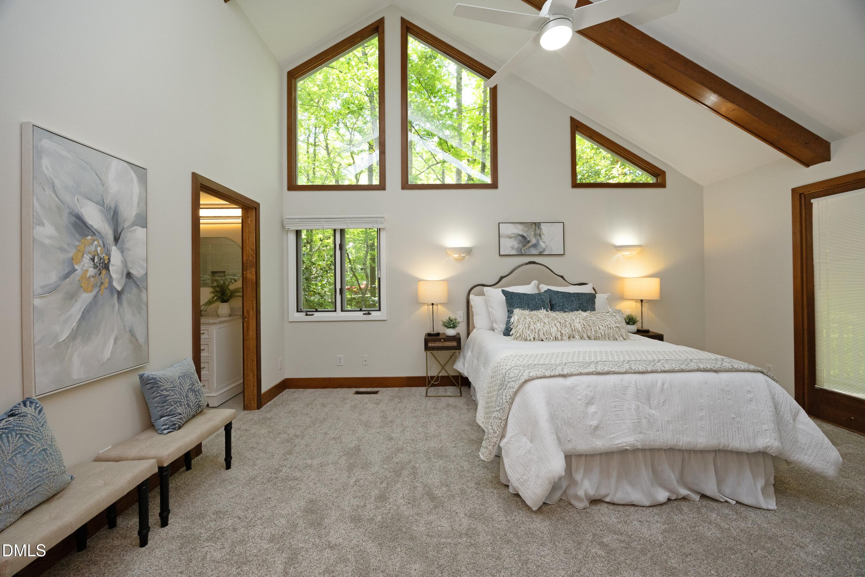 5321 Taproot Lane Durham, NC 27705 - Photo 11 of 27 a bedroom with a bed and a window