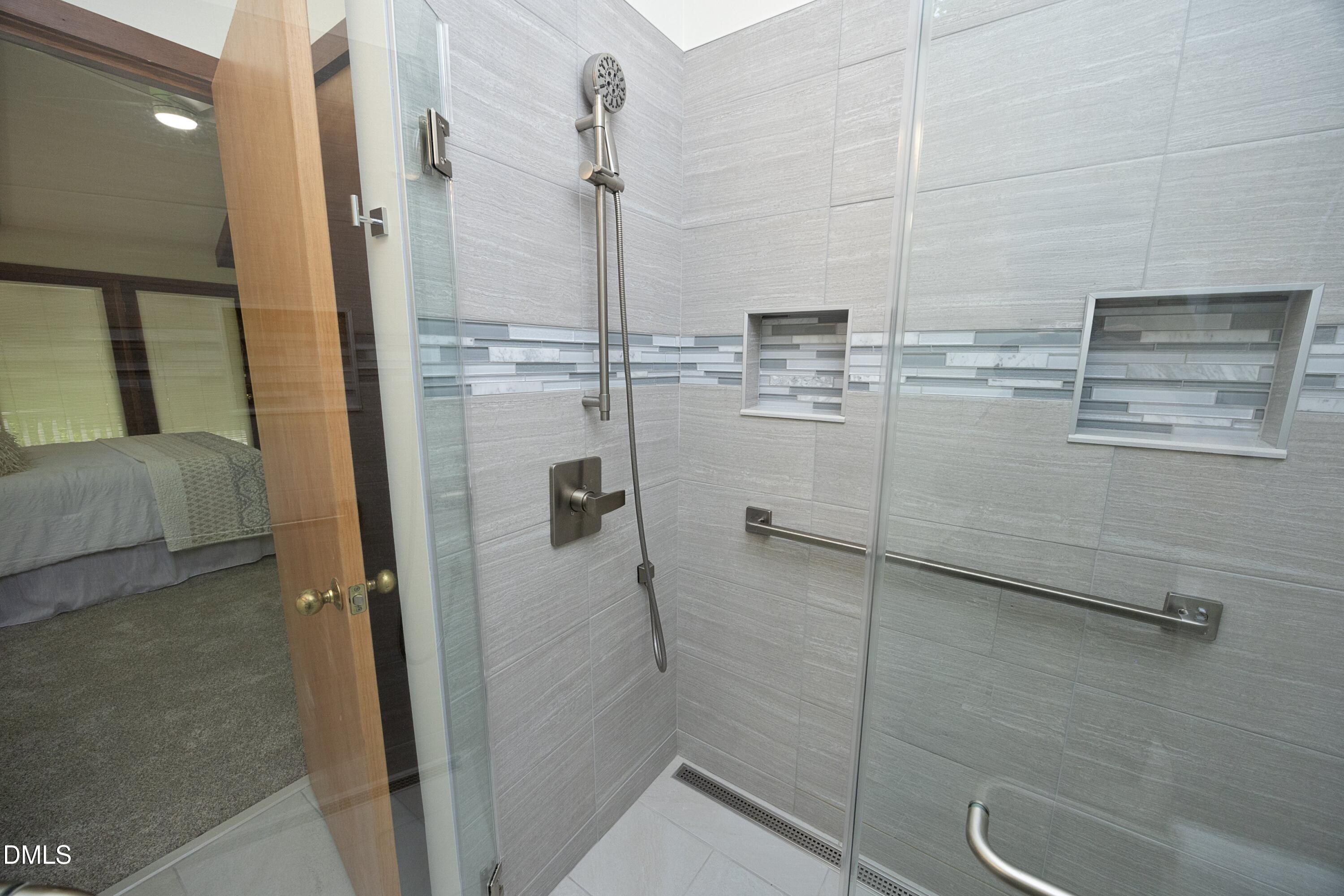 5321 Taproot Lane Durham, NC 27705 - Photo 14 of 27 a bathroom with a shower