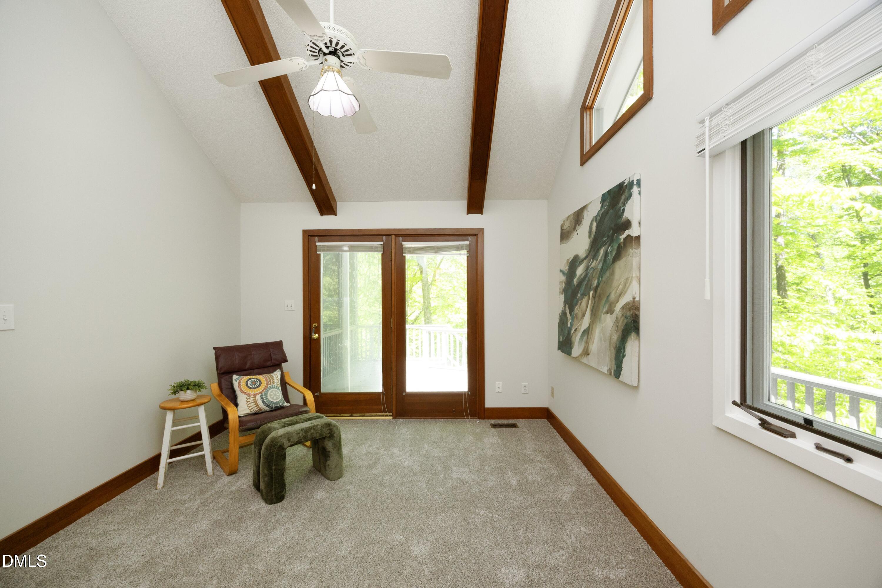 5321 Taproot Lane Durham, NC 27705 - Photo 16 of 27 a view of a livingroom with furniture and windows