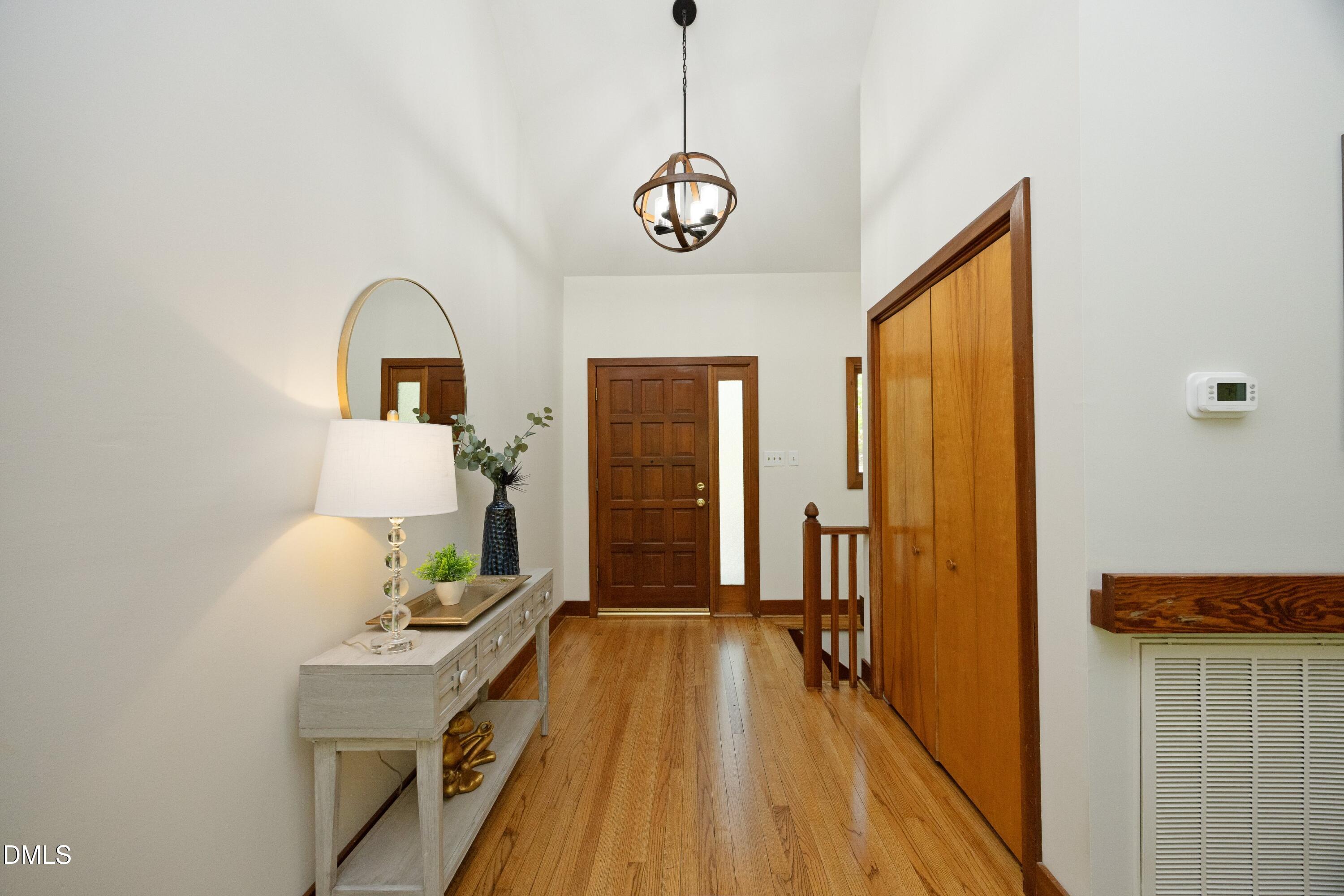5321 Taproot Lane Durham, NC 27705 - Photo 2 of 27 a view of a room with wooden floor and furniture