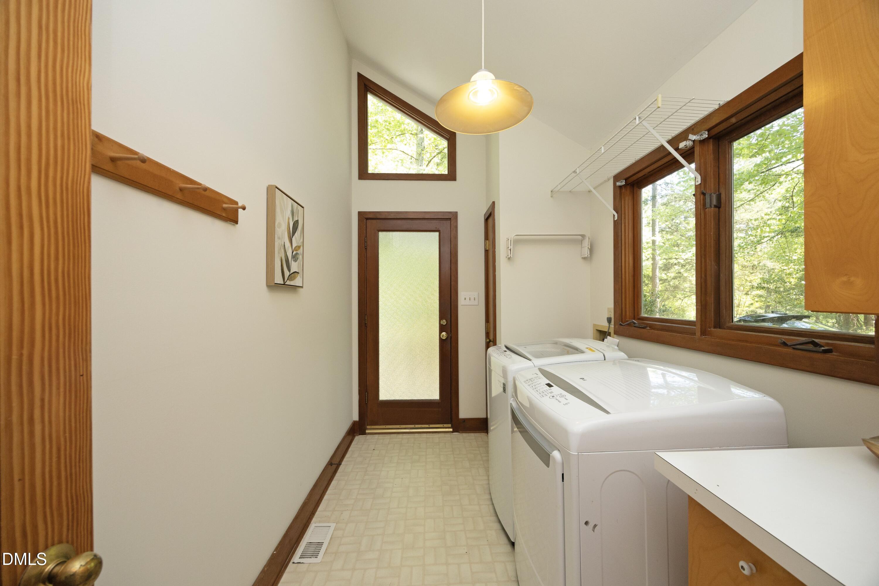 5321 Taproot Lane Durham, NC 27705 - Photo 25 of 27 a bathroom with a sink and a bathtub