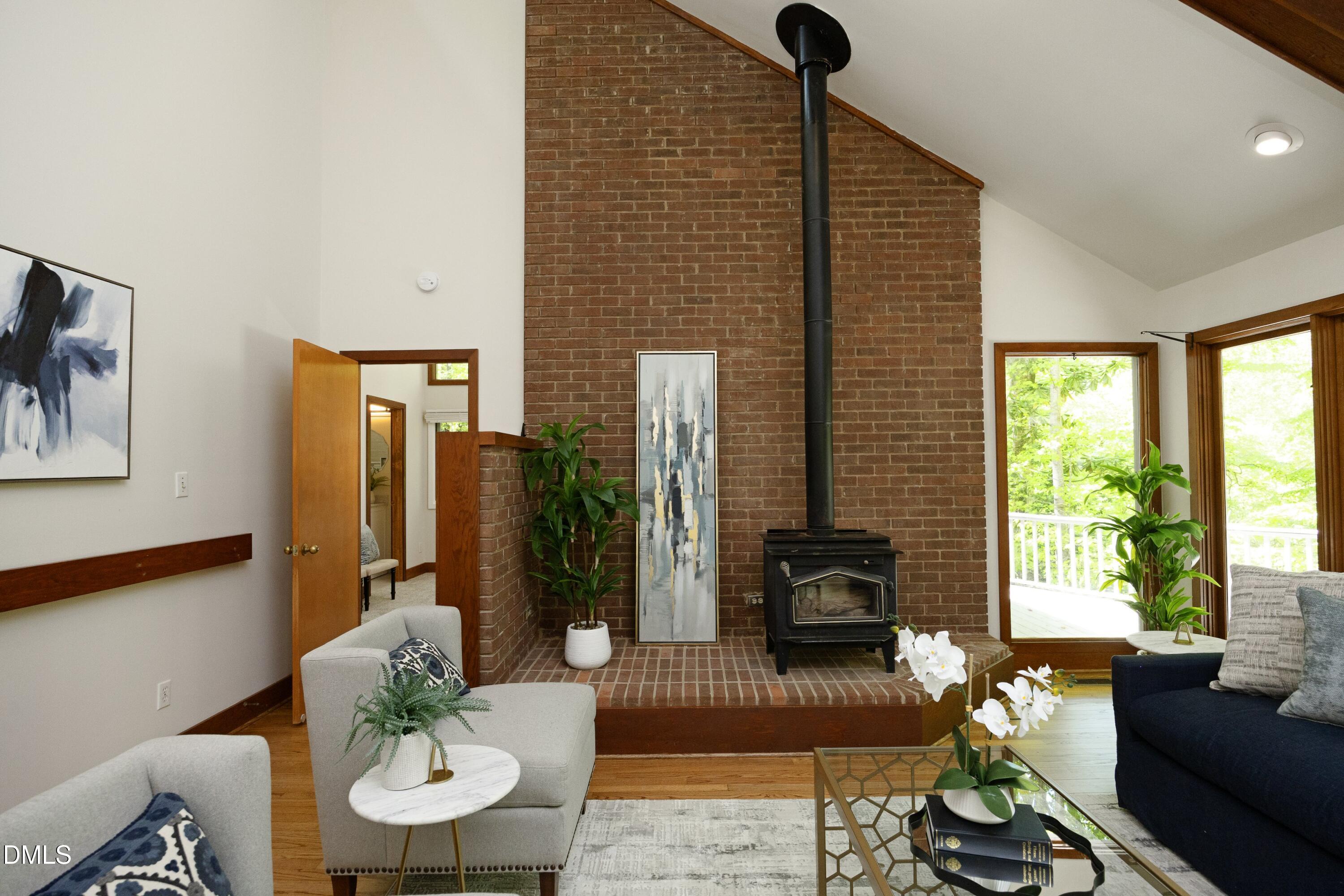 5321 Taproot Lane Durham, NC 27705 - Photo 5 of 27 a living room with furniture and wooden floor