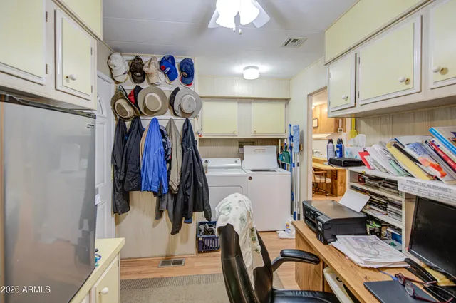 a view of a kitchen with workspace and a window
